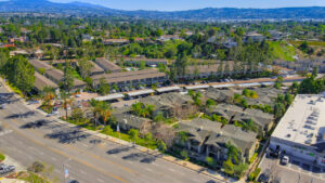 Aerial Exterior of Yorba Linda Palms and surrounding areas, hills in the distance.